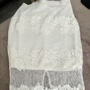 Bebe white with flowery 🌼 design pencil skirt